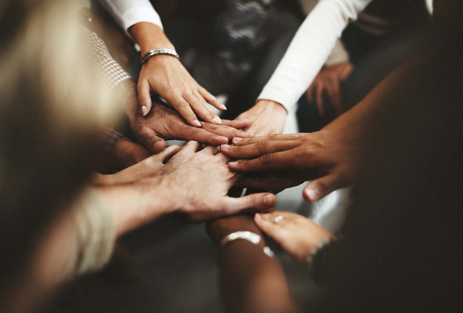 A photograph of office colleagues in a meeting.